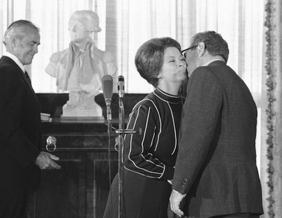 Shirley Temple Kissed By Henry Kissinger