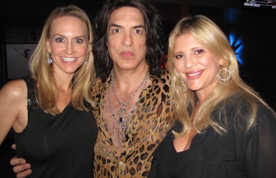 mcintaggart with gene simmons (kiss) on his sixtieth birthday